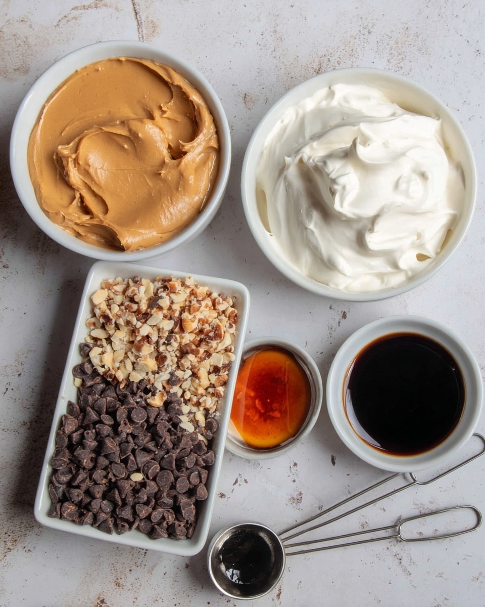 The image shows five small containers of ingredients placed on a white marbled surface. On the top left, there is a white bowl with a smooth, light brown peanut butter-like paste. To its right, a small round container holds a thick, white creamy substance with soft folds on top. Below these, a square white dish is filled with mixed crushed nuts and small dark chocolate chips, creating a textured contrast between the light brown nuts and dark chocolate. Next to the dish, there are two metal measuring spoons lying flat; the larger one contains a glossy amber liquid and the smaller one holds a very dark, almost black liquid. The overall look is neat with distinct layers of ingredients. photo taken with an iphone --ar 4:5 --v 7