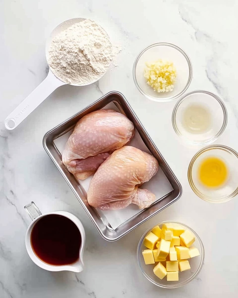 Two raw chicken pieces sit in a metal tray at the center of a white marbled surface. To the top left of the tray is a white measuring scoop filled with flour. Above the tray is a small clear bowl with minced garlic. To the top right are two small clear bowls, one with a light liquid and the other with a dark liquid. Below those bowls is a small white bowl filled with small yellow cubes that look like butter. To the left of the butter bowl is a white measuring cup filled with a dark reddish-brown liquid. The setup is clean and all items are spaced evenly on the white marbled background. Photo taken with an iphone --ar 4:5 --v 7