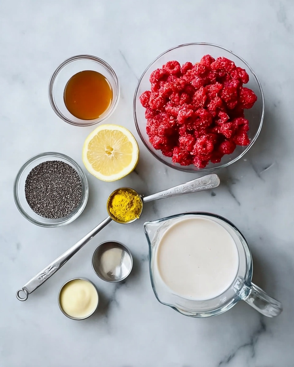 The image shows seven clear glass bowls and metal measuring spoons neatly arranged on a white marbled surface. In the center is a bowl filled with bright red raspberries. Above the raspberries is a lemon half displaying its yellow juicy inside. To the left of the raspberries is a small bowl containing dark amber honey. Below the honey is a bowl with black chia seeds. To the right of the raspberries is a bowl holding a creamy light yellow liquid. Below the lemon half are two metal measuring spoons, one filled with a small amount of yellow zest and the other with dark vanilla extract. At the bottom center is a large glass measuring cup filled with white almond milk. photo taken with an iphone --ar 4:5 --v 7