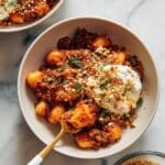 Millionaire Gnocchi with Red Sauce, Herbed Ricotta, and Golden Crispies Recipe