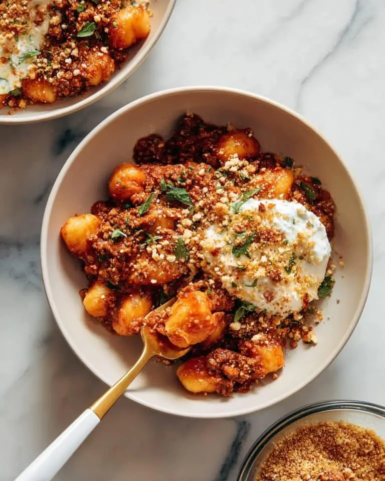 Millionaire Gnocchi with Red Sauce, Herbed Ricotta, and Golden Crispies Recipe