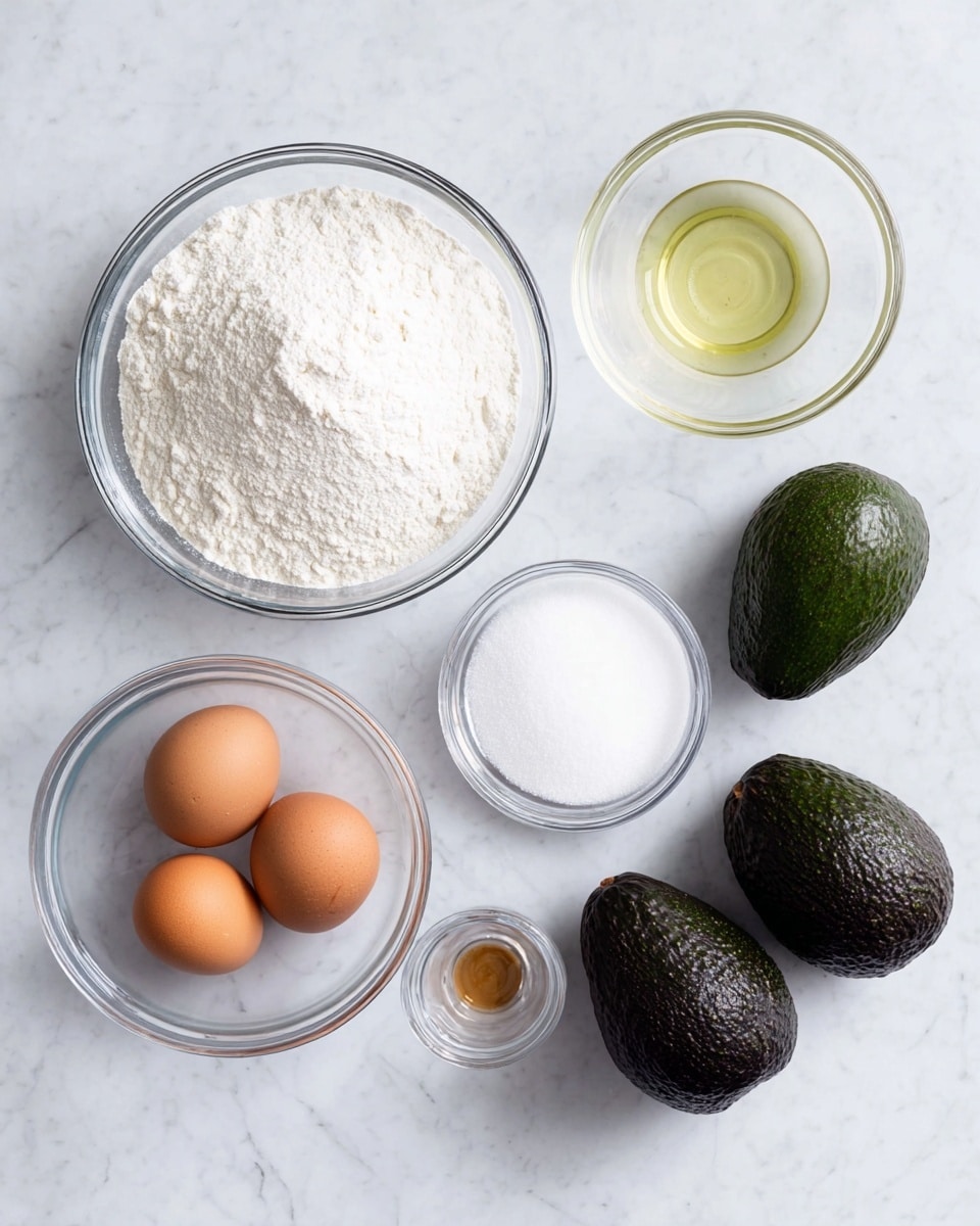 The image shows a white marbled surface with seven ingredients arranged neatly. Starting from the top left corner, there is a large clear glass bowl filled with white flour. Below it is a smaller clear glass bowl holding three brown eggs. To the right of the eggs is a medium clear glass bowl filled with white granulated sugar. Above the sugar is a small clear glass bowl containing a light brown liquid, possibly vanilla extract. Above and a bit right of that is another small clear glass bowl with a white powder, likely baking powder or salt. On the far right side, there are two whole ripe avocados with dark green bumpy skin. The lighting is soft and even, and the photo taken with an iphone --ar 4:5 --v 7