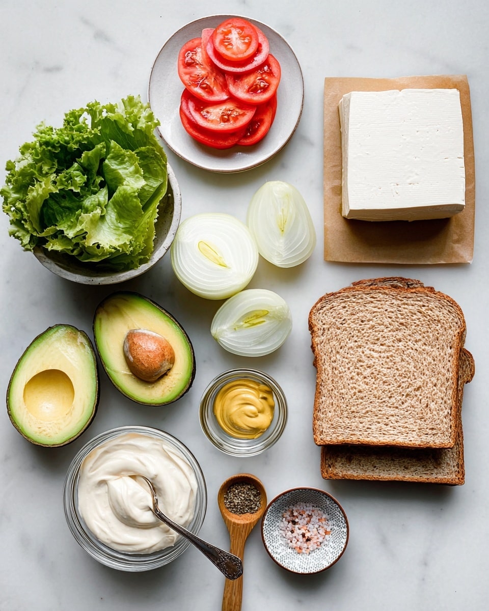 The image shows various sandwich ingredients neatly arranged on a white marbled surface. There are two slices of whole grain bread on the right side, a large white block of tofu on a white plate above the bread, and a small white plate with seven thin red tomato slices above the tofu. Two halves of a white onion with pale yellow centers sit in the middle. To the left, there is a small bowl filled with green leafy lettuce. Below that, two avocado halves display bright green flesh, one with a brown seed inside. Near the bottom center is a small glass bowl with thick white mayonnaise, a small metal cup with yellow mustard beside it, a wooden spoon holding a light yellow powder, and a small ribbed dish containing pink salt and black pepper. Photo taken with an iphone --ar 4:5 --v 7