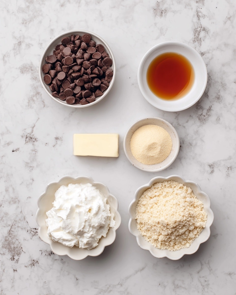 The image shows five small white bowls placed on a white marbled surface. The top left bowl is round and filled with dark brown chocolate chips, smooth and shiny. To its right, a small round bowl contains a thin, amber-colored liquid. Below these, a slightly larger bowl holds a pale yellow powder with a fine grain texture. To its lower left, a scalloped edged bowl is filled with fluffy white cream, soft and smooth. At the bottom right, another scalloped edged bowl contains a crumbly, light beige mixture, coarse in texture. All items are neatly arranged and evenly spaced. Photo taken with an iphone --ar 4:5 --v 7