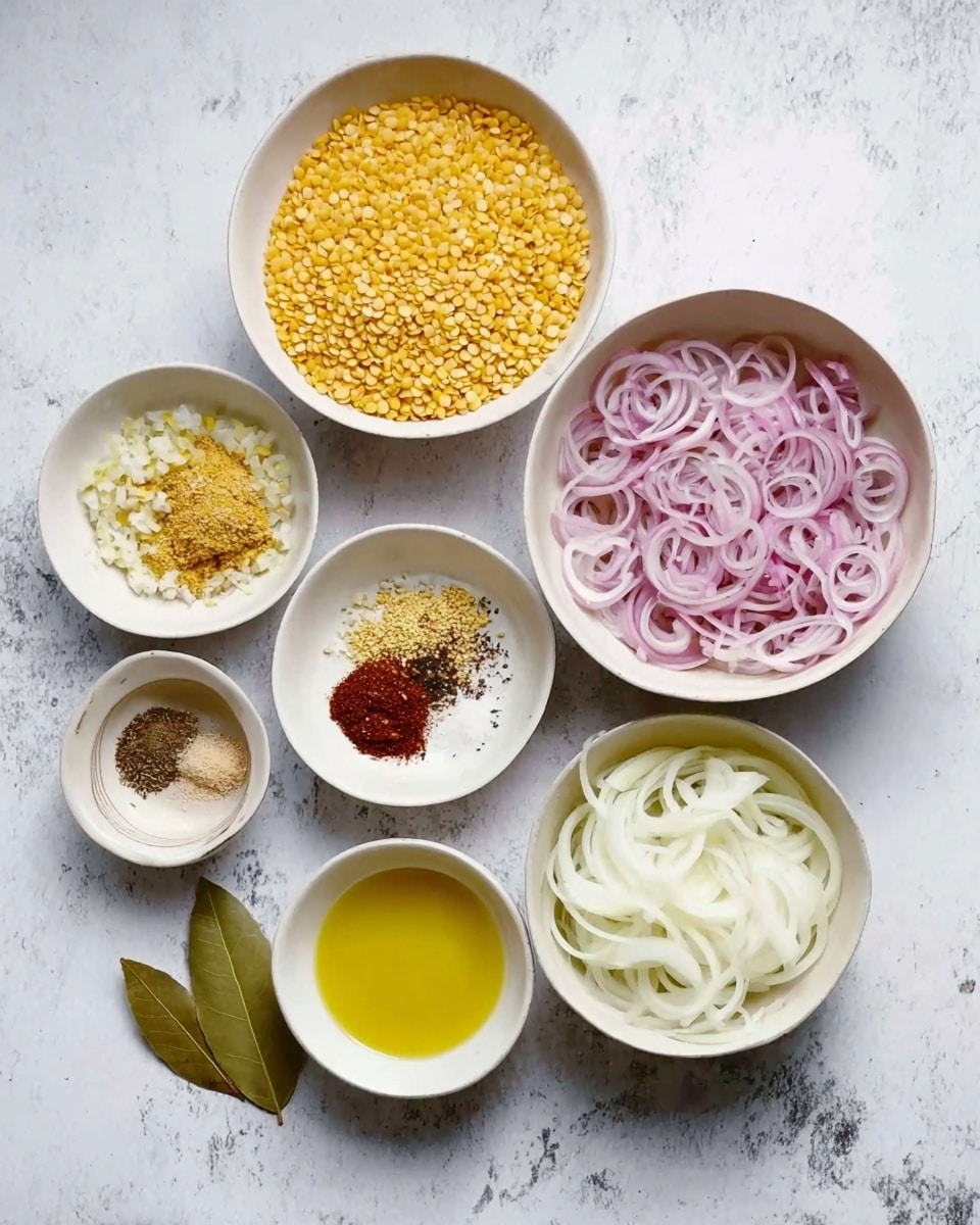 The image shows seven white dishes placed on a white marbled surface. At the center bottom is a small bowl filled with light yellow oil. To the right of the oil bowl are two bay leaves resting on the surface. Directly above this is a large white bowl filled with thinly sliced white onions. To the left of the large onion bowl are two small white bowls; the upper one contains a yellow and brown spice mix, and the lower one holds a red spice powder. Above these small bowls are two larger white bowls; the left bowl contains yellow lentils, and the right bowl has small yellow rice grains. Above all is a white bowl filled with thinly sliced red onions mixed with white onion slices. A woman’s hand is holding a white bowl near the top left of the image. photo taken with an iphone --ar 4:5 --v 7