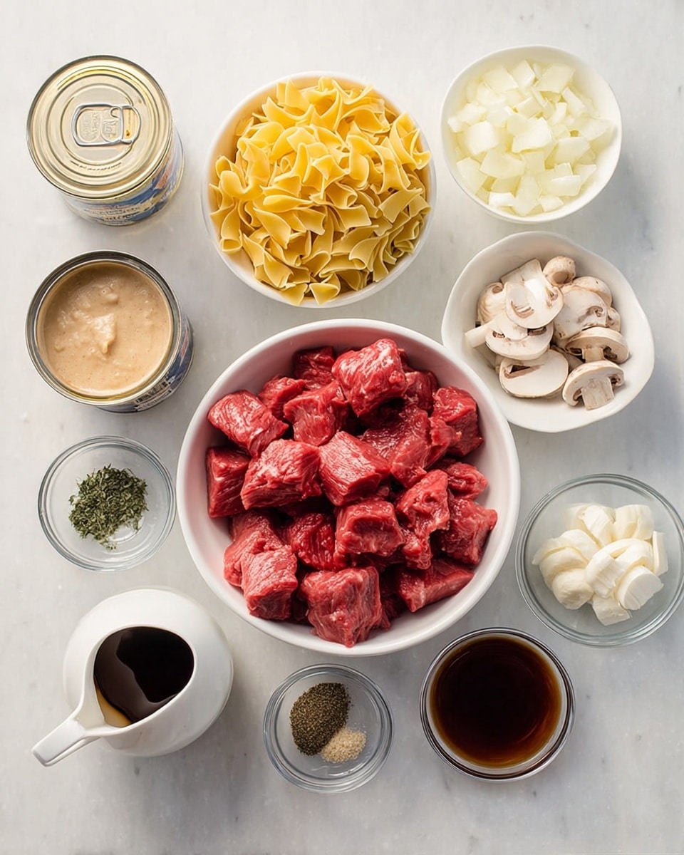 A white bowl filled with bright red raw meat cubes sits in the center on a white marbled surface. To the top right, three small white bowls hold chopped white onions, sliced white mushrooms, and a thick white cream, arranged vertically. Above the meat bowl, a white bowl contains three nests of yellow uncooked pasta. To the left of the pasta, there is an open can with light brown creamy sauce visible inside. Below the meat bowl, a small white pitcher has dark brown liquid pouring from its spout, next to it are two small glass bowls, one with ground black pepper and the other with a mix of green herbs and light tan powder. To the right of these, a small glass bowl holds a dark brown liquid. The photo taken with an iphone --ar 4:5 --v 7