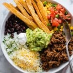 Homemade Burrito Bowls with Spiced Beef, Fresh Avocado, and Crispy Tortilla Strips Recipe