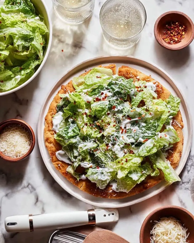 Viral Chicken Crust Caesar Salad Pizza Recipe