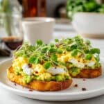 Hashbrown Avocado Toast with Scrambled Eggs, Cottage Cheese, and Spicy Toppings Recipe