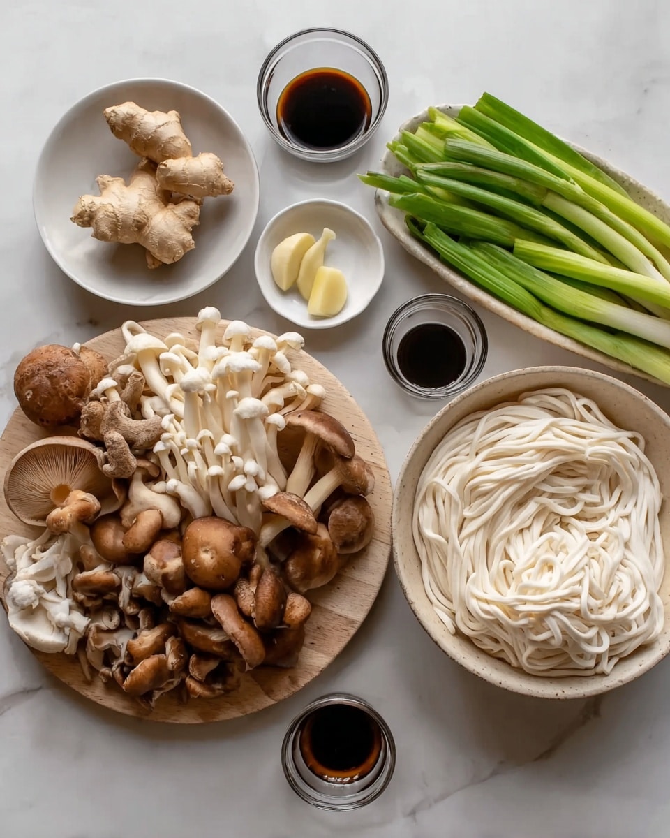 The image shows a white wooden round plate full of different types of brown mushrooms with varied textures, some smooth and some more textured, placed on a white marbled surface. To the right, there is a beige bowl filled with thick, coiled white noodles, next to a white bowl holding green onion stalks and chopped green onions. Above these are three small white round plates arranged in a semi-circle: one with a piece of fresh ginger and two garlic cloves, one with a small amount of dark soy sauce, and the third empty. There are also two small clear glass cups filled with dark and light liquids. Everything is neatly arranged and softly lit, photo taken with an iphone --ar 4:5 --v 7