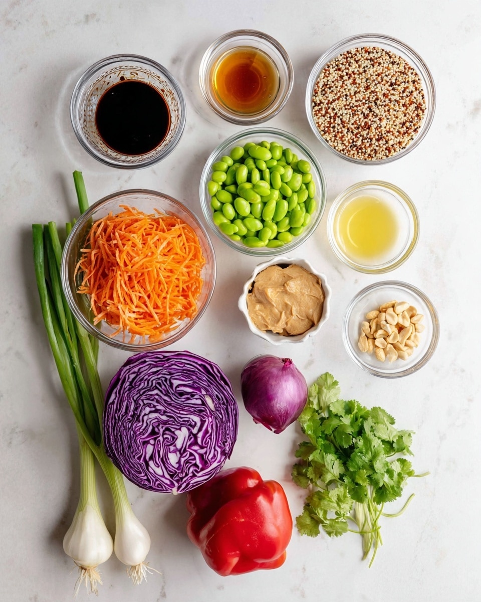 The image shows several ingredients neatly arranged on a white marbled surface: a small glass bowl of dark soy sauce, a smaller bowl of amber liquid likely vinegar, a clear bowl of light peanut butter, minced fresh ginger and garlic in tiny glass bowls, a small bowl of clear oil, a bowl of lemon juice, a bowl of whole peanuts, and a larger bowl filled with multicolored quinoa grains. Fresh vegetables include bright green edamame in a glass bowl, shredded orange carrots in another white bowl, half a purple cabbage showing its intricate layers, a whole small red onion, a bundle of fresh green cilantro, three green onions with white bulbs and roots visible, and a whole red bell pepper. All items are placed separately and clearly visible on the white marbled background. photo taken with an iphone --ar 4:5 --v 7