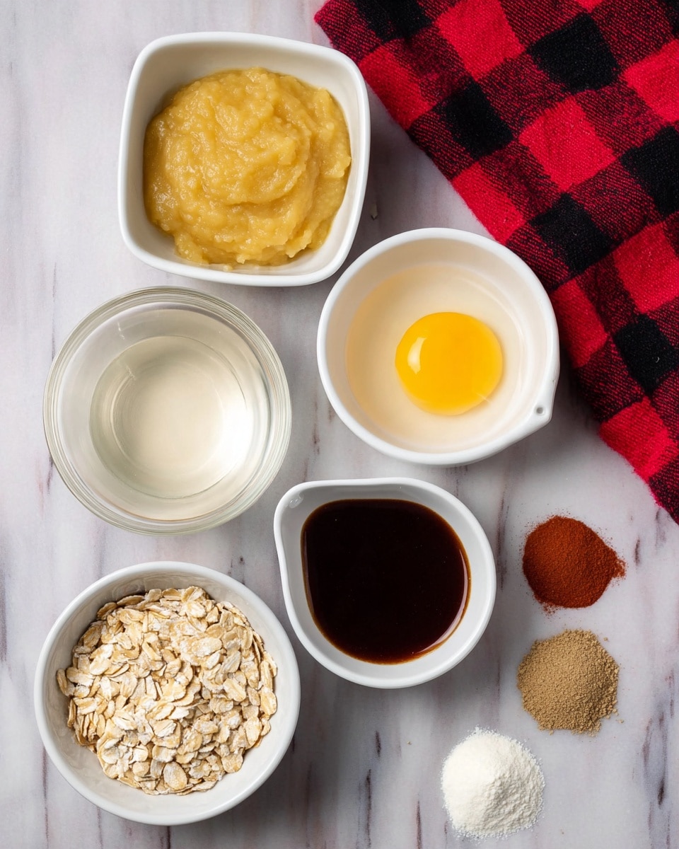 A top-down view shows six white bowls on a white marbled surface with a red and black checked cloth on the upper right corner. The bowls contain different ingredients: the top left square bowl holds a smooth yellowish puree, below it a round bowl has a raw egg with a clear white and bright yellow yolk. To the right of the egg, a small bowl with a clear liquid; below it, a small bowl filled with dark brown syrup or molasses with a small handle on the right side. The bottom left bowl is filled with light beige rolled oats, and the bottom right bowl has four powdered spices arranged in small piles, showing light brown, darker brown, white, and reddish-brown colors. Photo taken with an iphone --ar 4:5 --v 7